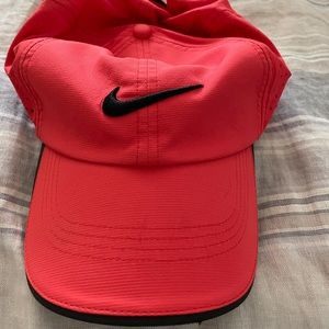 coral Nike golf hat